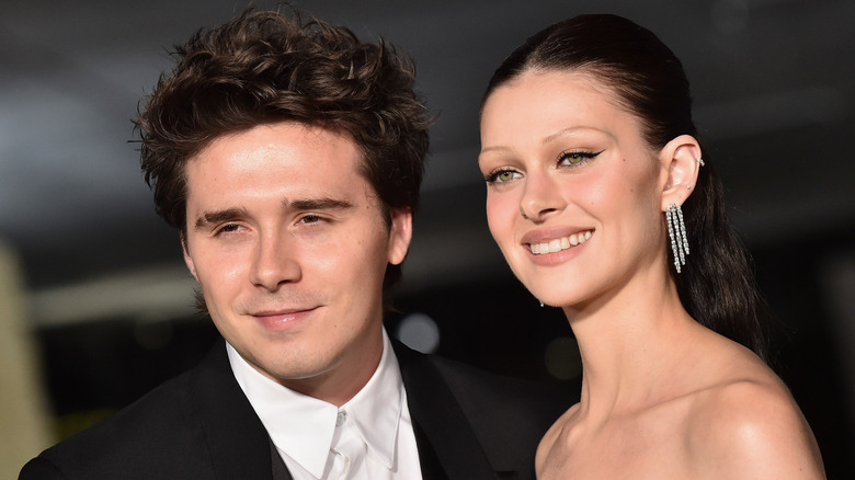 Brooklyn Beckham et Nicola Peltz souriants