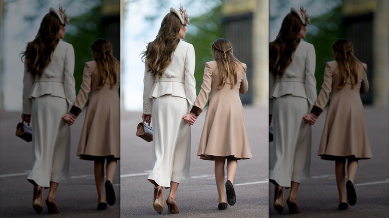 Kate Middleton et la princesse Charlotte se tiennent la main après les services religieux du dimanche de Pâques à Windsor